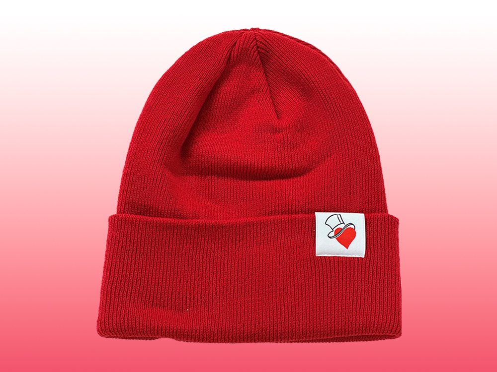a red toque with a heart logo